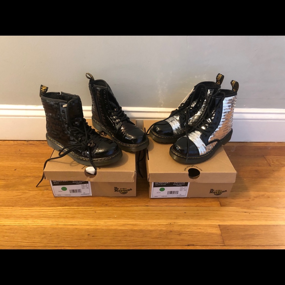 Brand new. Dr. Martens black lamper boots.